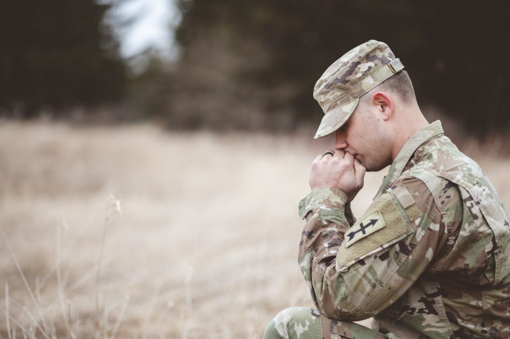 Veteran looking down