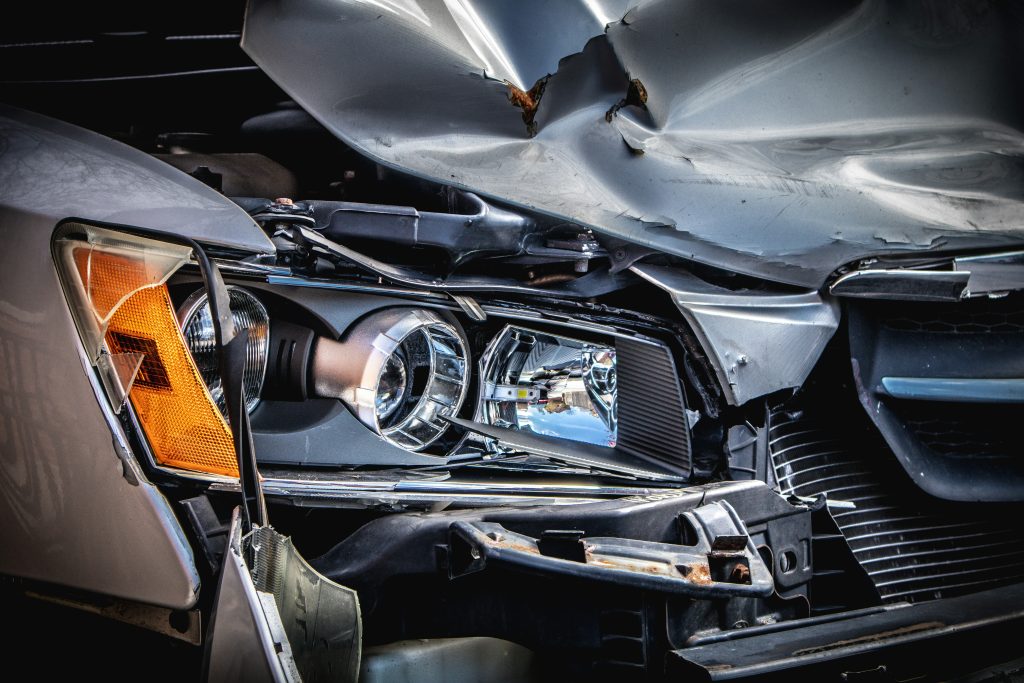 Severe front-end damage to a vehicle after an auto accident, illustrating the trauma and recovery covered under ICBC counselling benefits.
